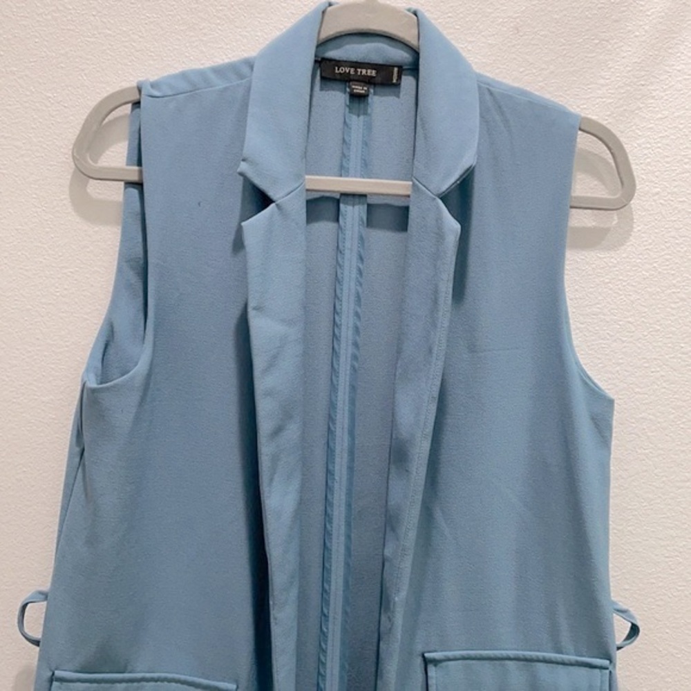Long vest light blue size M